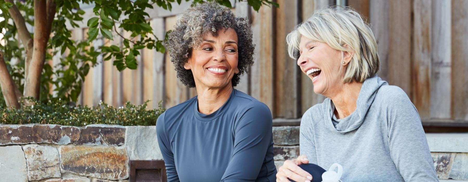 a couple of women laughing